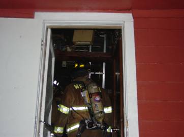 Fire fighters entering building